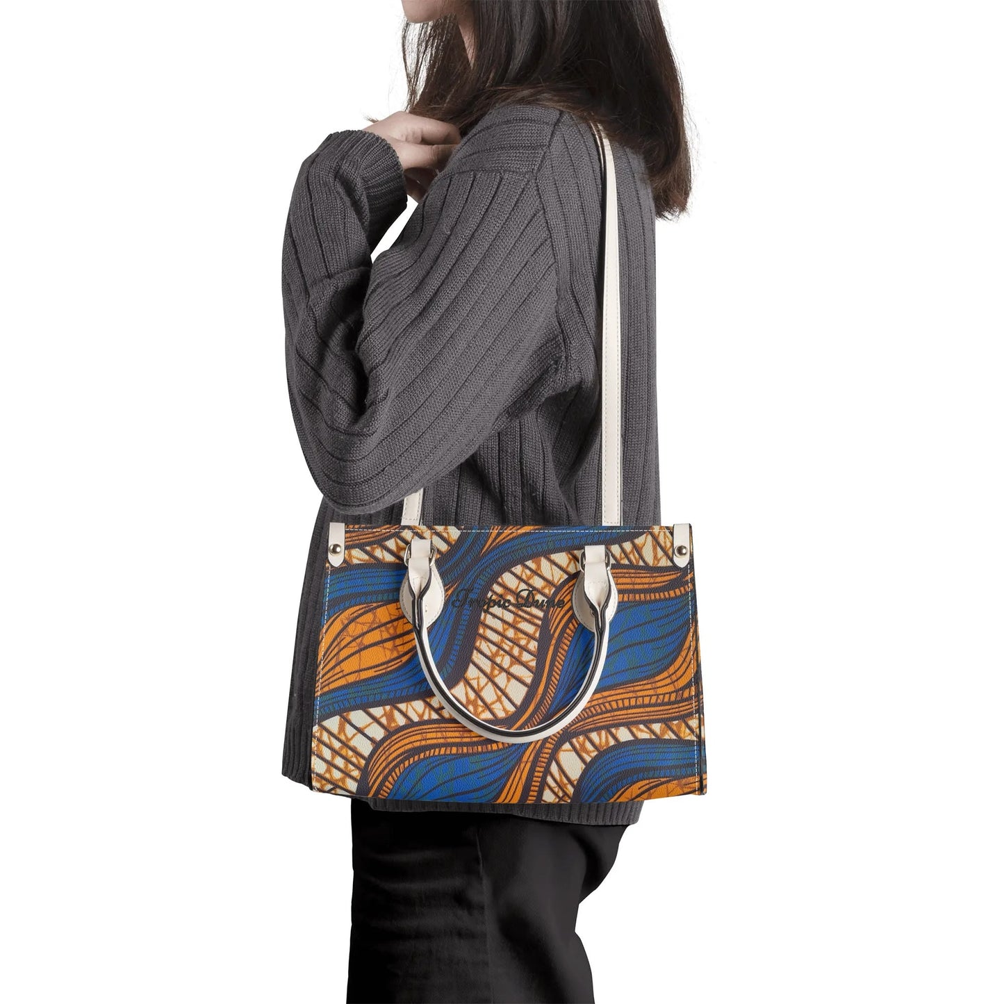 niamey tropic dune faux leather satchel